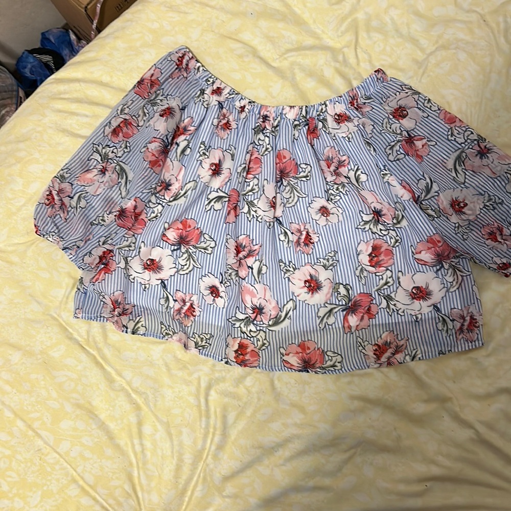 Blue and white striped floral blouse.